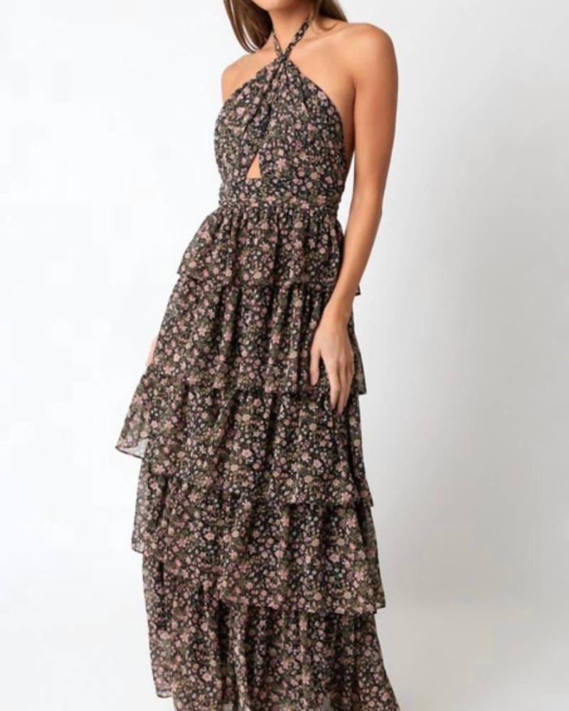 Front of a model wearing a size Large Ruffle Skirt Maxi Dress In Floral in Floral by OLIVACEOUS. | dia_product_style_image_id:342270